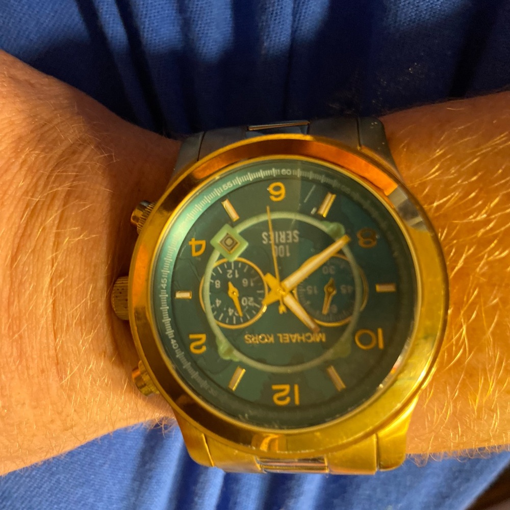 Michael kors gold watch with teal interior! Brand new and with extra links
